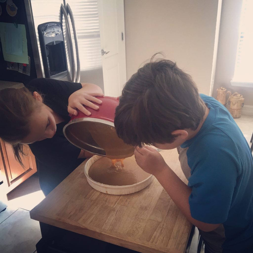 Kids baking pie, a great indoor activity for kids